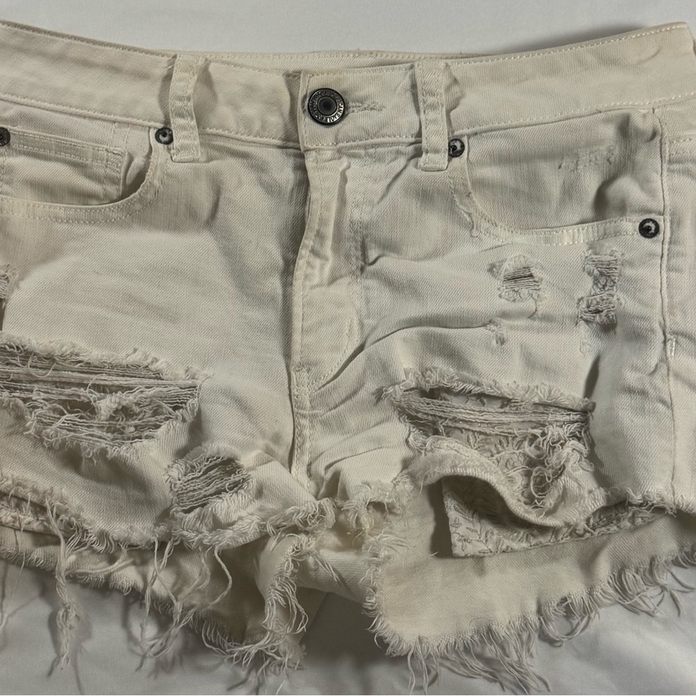 American Eagle Outfitters Distressed Cream Denim Shorts